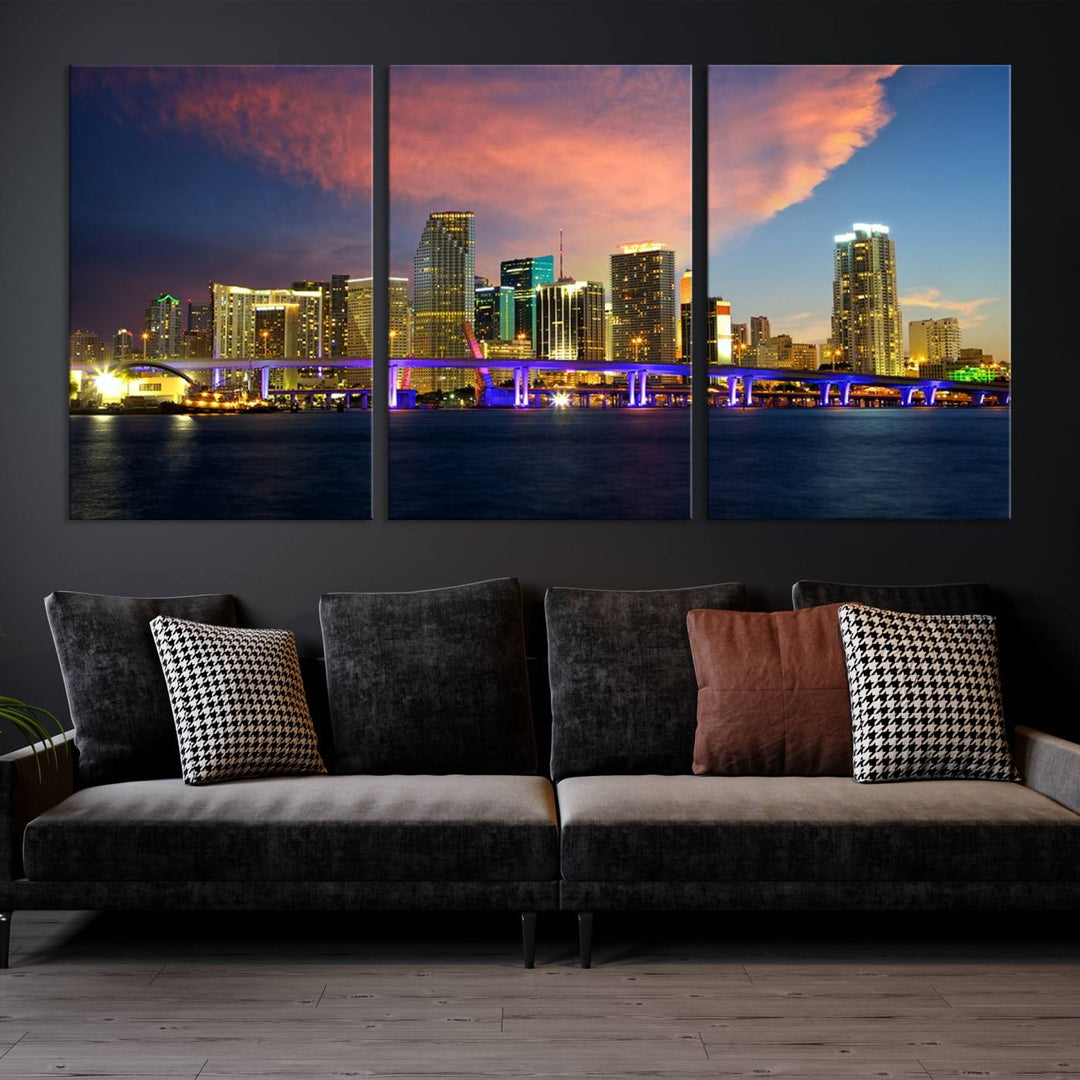 The modern living room is enhanced by the "Miami City Wall Art Canvas Print," a stunning triptych portraying a city skyline at sunset. These canvases are gallery wrapped and made from museum-quality materials, featuring a UV-protective coating to ensure lasting vibrancy.