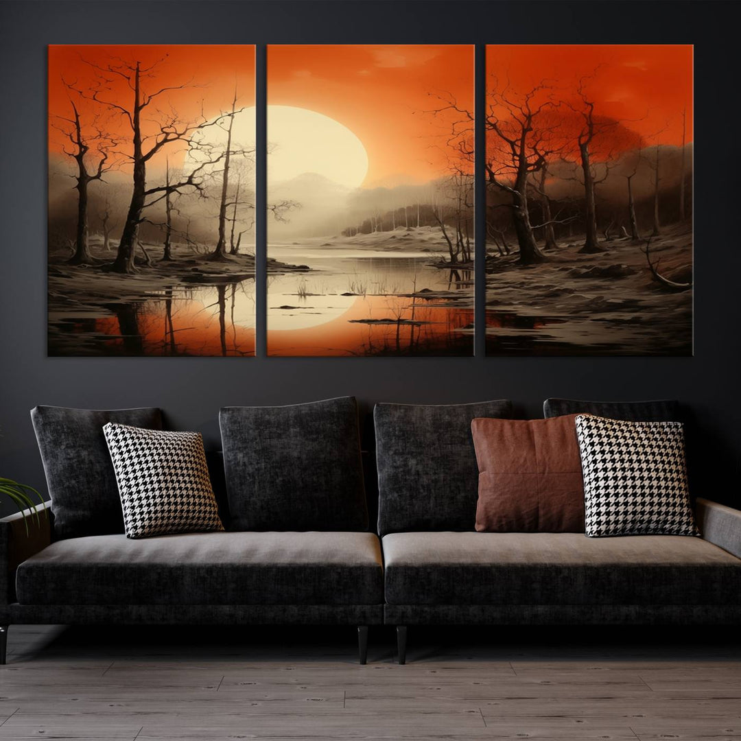 The "Abstract Watercolor Trees and Sunset on Lake Wall Art" is a triptych masterpiece, showcasing an orange-hued landscape of barren trees and a large sun. Displayed on museum-quality canvases with UV-protective coating, it creates a striking visual element in any space.