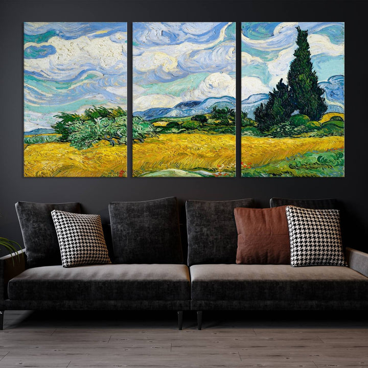 A contemporary living room features a large triptych of "Wheatfield With Cypresses By Van Gogh Painting Wall Art Canvas Print." Crafted on museum-quality canvas, this artwork brings a sense of elegance and craftsmanship reminiscent of professional artistry.