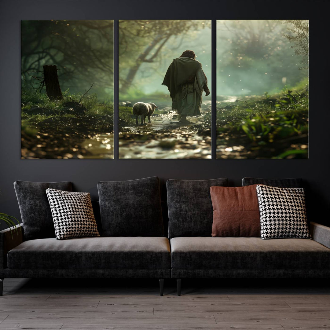 The wall art piece, titled "Jesus Shepherd a Lost Lamb Canvas Wall Art Print," is suspended on the wall and depicts a robed figure and a lamb wandering along a forest path.