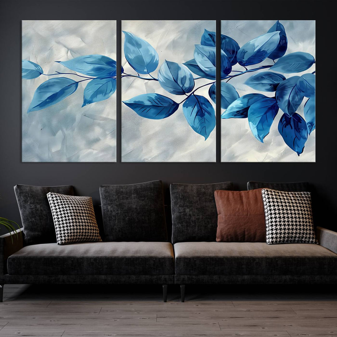 A Blue Leaf Abstract Wall Art Canvas Print, featuring a textured background and gallery-quality finish, is displayed.