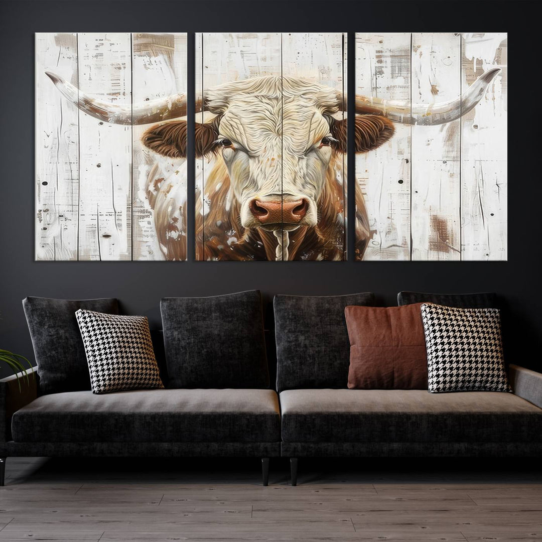 The dimly lit room is enhanced with Western charm by the Rustic Longhorn Bull Wall Art Canvas Set—Western-Inspired Farmhouse Décor, elegantly displayed on the wall.