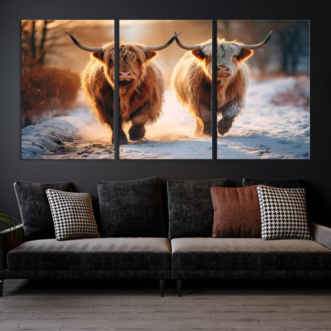 The living room showcases a triptych from the Scottish Highland Cow Horn Farm Wall Art Canvas Print collection, depicting two Highland cows running in the snow. Complementing this are handmade wall art pieces with a gallery-quality finish that add an elegant touch.