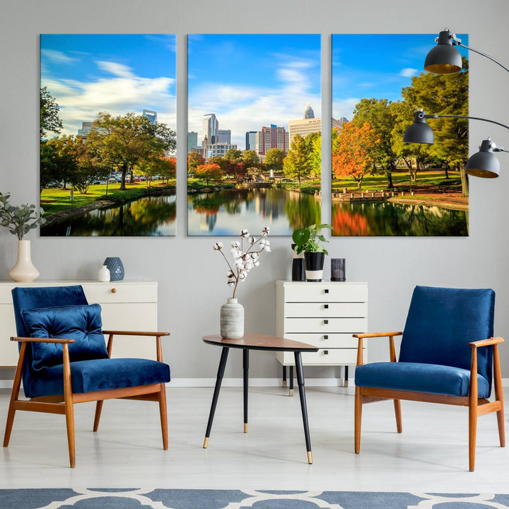 The Charlotte City Park at Spring Skyline Cityscape View wall art canvas print is a triptych featuring a scenic park with a lake and city skyline. It is gallery-wrapped on museum-quality canvases.