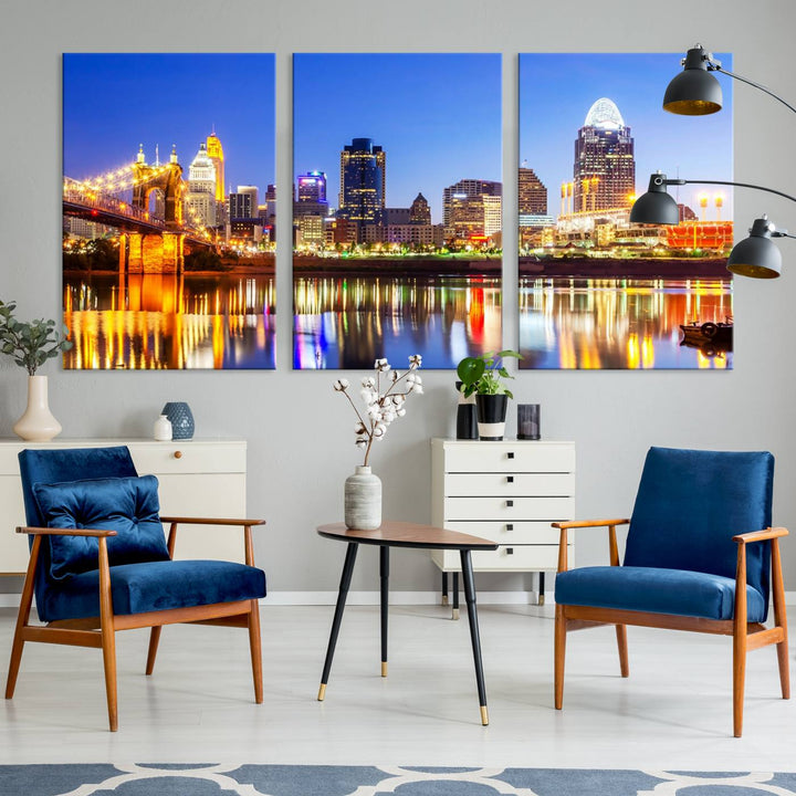 The "Cincinnati City Lights Night Skyline Cityscape View Wall Art Canvas Print" is a gallery-wrapped, museum-quality canvas illustrating a lit-up bridge and skyline at night. Enhanced with a UV-protective coating, this piece ensures lasting vibrancy.