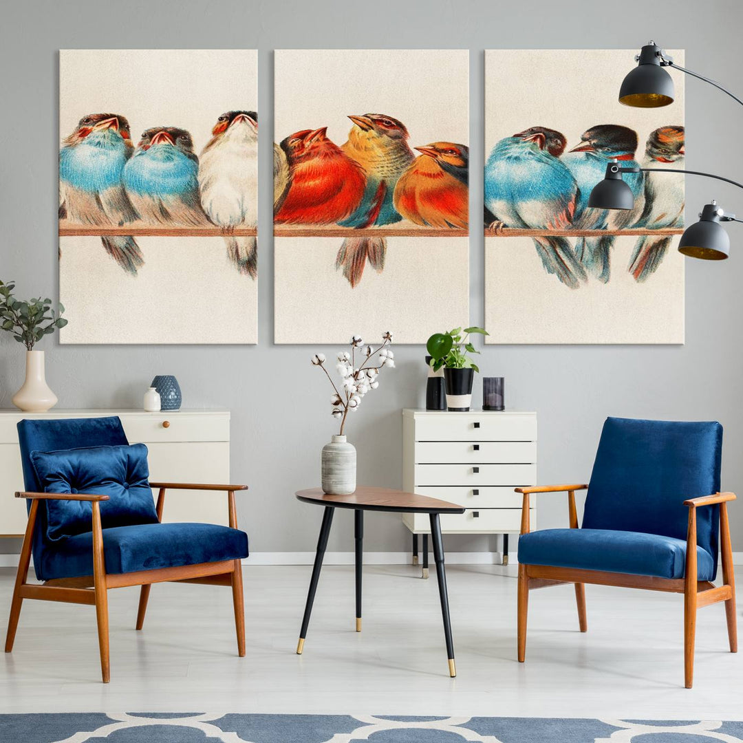 The Abstract Birds Wall Art Canvas Print, featuring a triptych of colorful birds perched on a branch, is printed on museum-quality canvas and equipped with a UV-protective coating and ready-to-hang design. This artwork adds vibrant elegance to your living space.