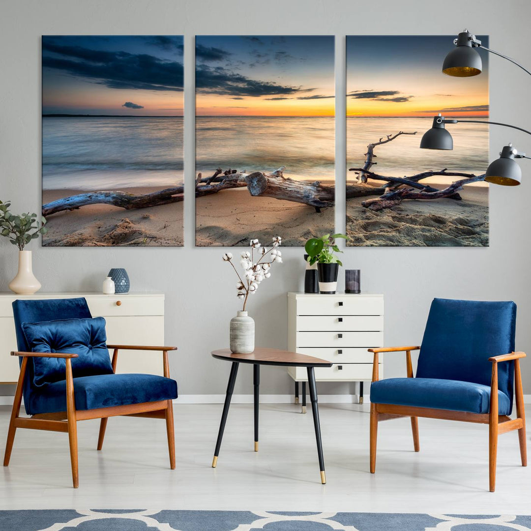 A captivating piece of Ocean Sunset Beach Wall Art Canvas Print, gallery wrapped, graces the gray wall.