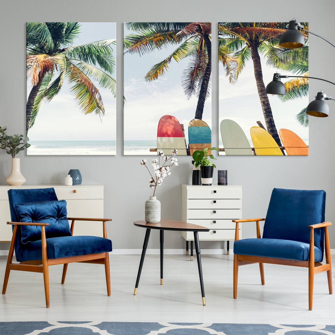 The room showcases The Palm and Surfing Board Wall Art Canvas Print, a triptych of palm trees and surfboards by the beach, elegantly gallery wrapped for a sophisticated finish.