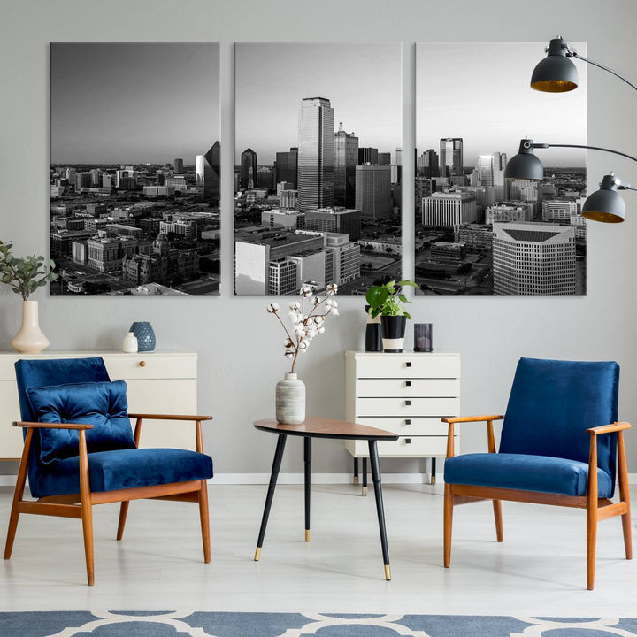 A modern living room showcases the Dallas City Lights Skyline Black and White Wall Art Cityscape Canvas Print. This gallery-wrapped piece offers a sleek finish and is crafted from museum-quality pollycotton. It features a UV-protective coating to ensure lasting vibrancy.