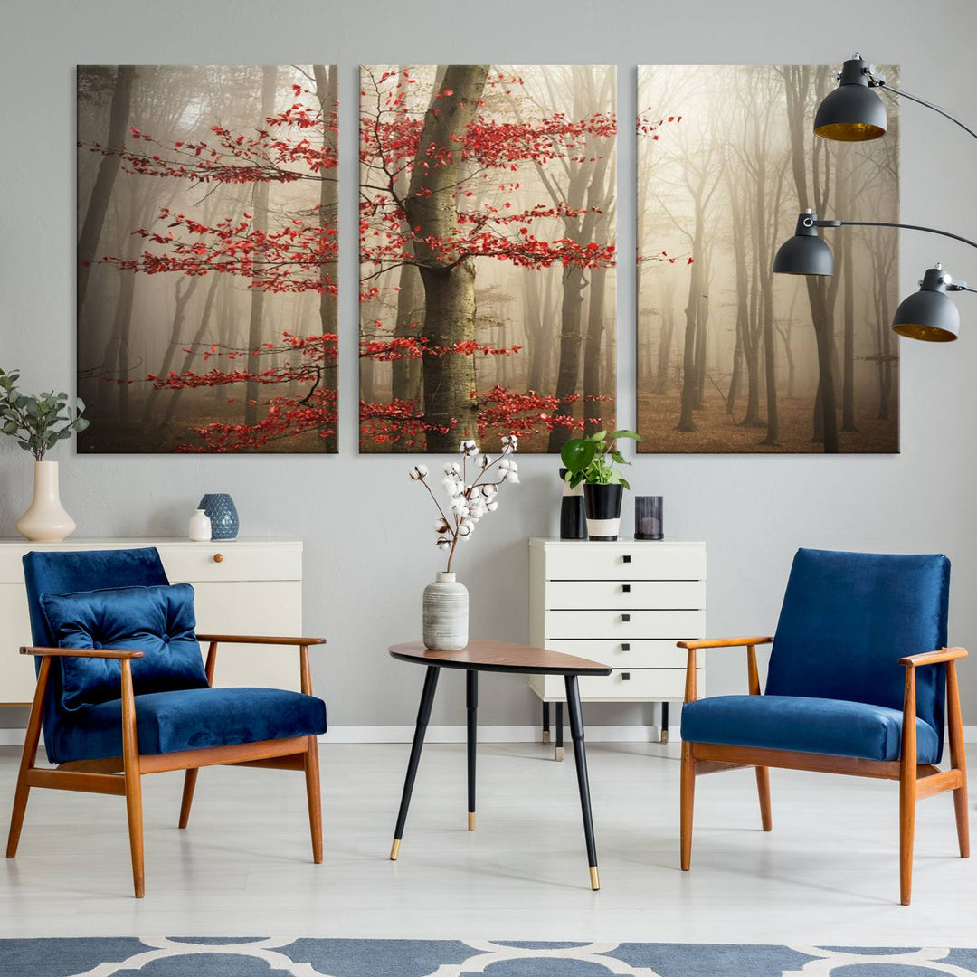 The living room features the Foggy Forest Wall Art, an Autumn Trees Canvas Print that showcases a serene nature scene with foggy woodland decor and a tree adorned in vibrant red leaves.