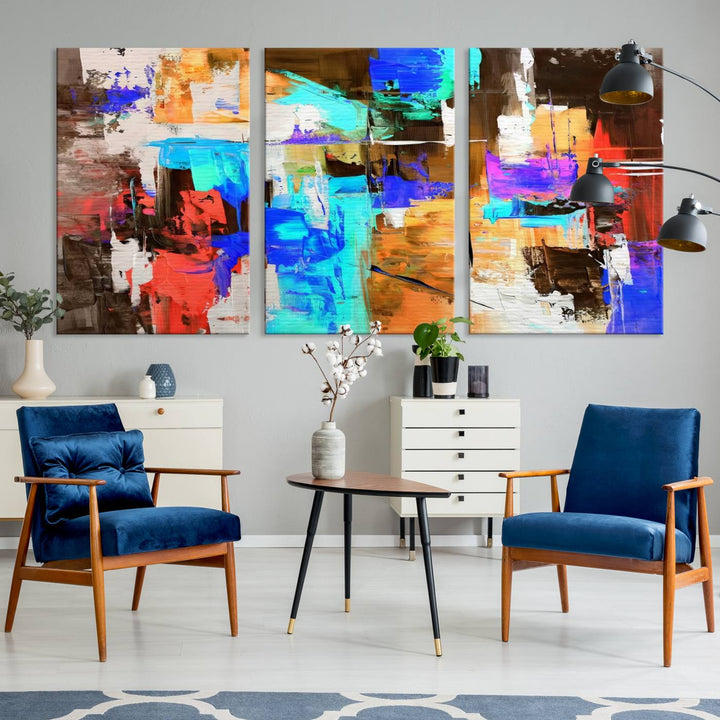 In a modern living room, the "Colorful Abstract Wall Art Canvas Print" serves as a stunning triptych centerpiece on museum-quality canvas, ready to hang. Its UV-protective coating ensures enduring vibrancy.