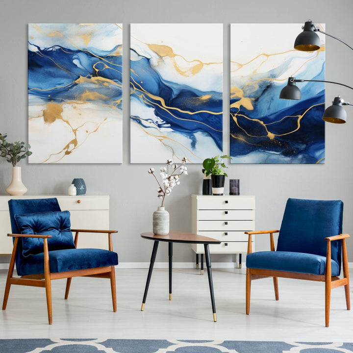 The Blue Abstract Wall Art is displayed as a triptych on museum-quality canvas, showcasing a blue and gold abstract design. The artwork includes a UV-protective coating to maintain its vibrancy and comes with the benefit of free shipping.