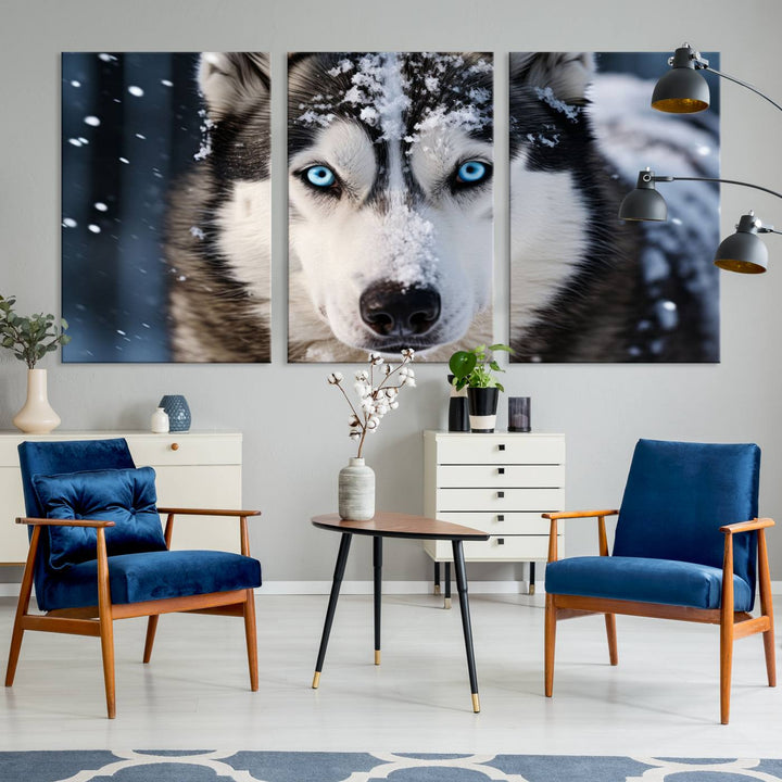 A digital art piece titled "Winter Siberian Husky Wolf Wall Art Canvas Print" showcases a blue-eyed husky blanketed in snow. Printed on high-quality canvas, it is an ideal choice for nature and dog enthusiasts.