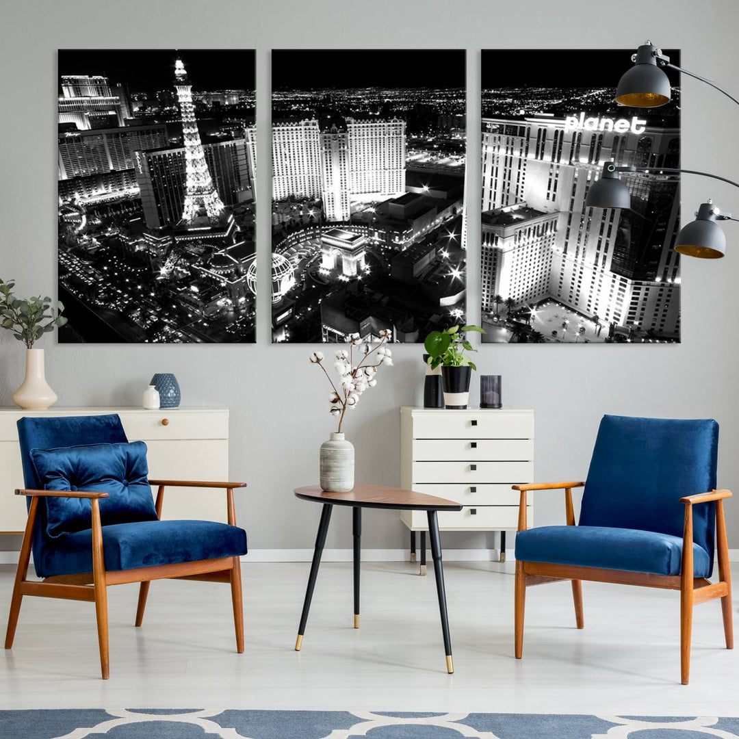 The Las Vegas Wall Art Canvas Print is a black and white triptych that showcases a city skyline at night. Crafted on museum-quality canvas with a UV-protective coating, it serves as an elegant and ready-to-hang focal point in the room.