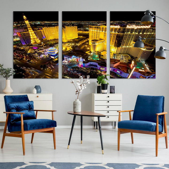 The modern living room features a Las Vegas Wall Art Canvas Print, a museum-quality triptych showcasing a vibrant cityscape with neon lights.