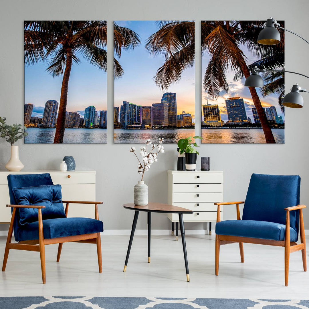 The Wall Art MIAMI Canvas Print features a triptych design depicting palm trees and a city skyline at sunset.