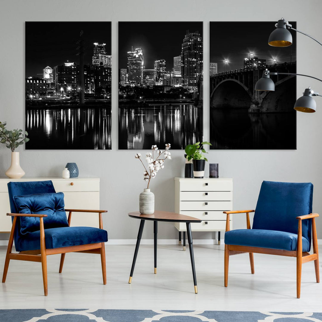 The "Minneapolis Wall Art Canvas Print, Minnesota City Wall Art Print, Minnesota Cityscapes Wall Art" features a black and white triptych of a city skyline with a bridge. Crafted on museum-quality canvas, this gallery-wrapped artwork is finished with a UV-protective coating to ensure lasting beauty.