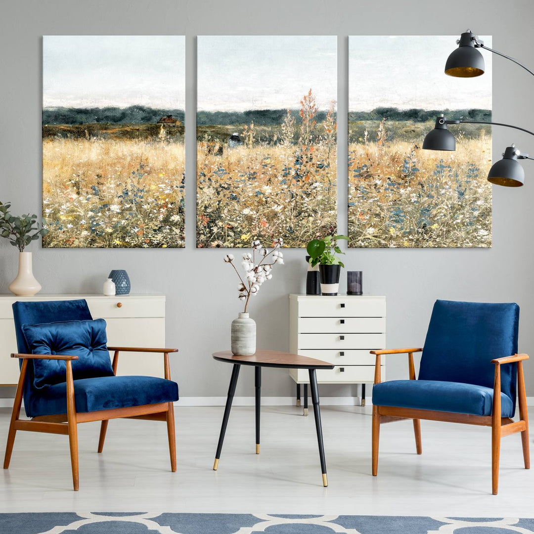 The "Wildflower Field Wall Art Canvas" brings rustic charm to the room with its nature-inspired landscape print, making it a perfect addition to the living room or office.