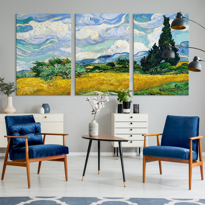 A contemporary living room features a large triptych of "Wheatfield With Cypresses By Van Gogh Painting Wall Art Canvas Print." Crafted on museum-quality canvas, this artwork brings a sense of elegance and craftsmanship reminiscent of professional artistry.