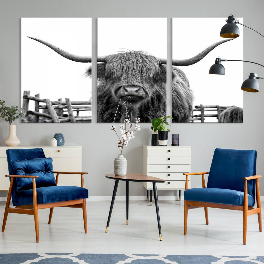 The Longhorn Canvas Print, featuring a black-and-white triptych of a Bighorn cow with shaggy fur and impressive long horns, is elegantly showcased. This wall art piece boasts a gallery-quality finish on premium canvas, bringing sophistication to any room.