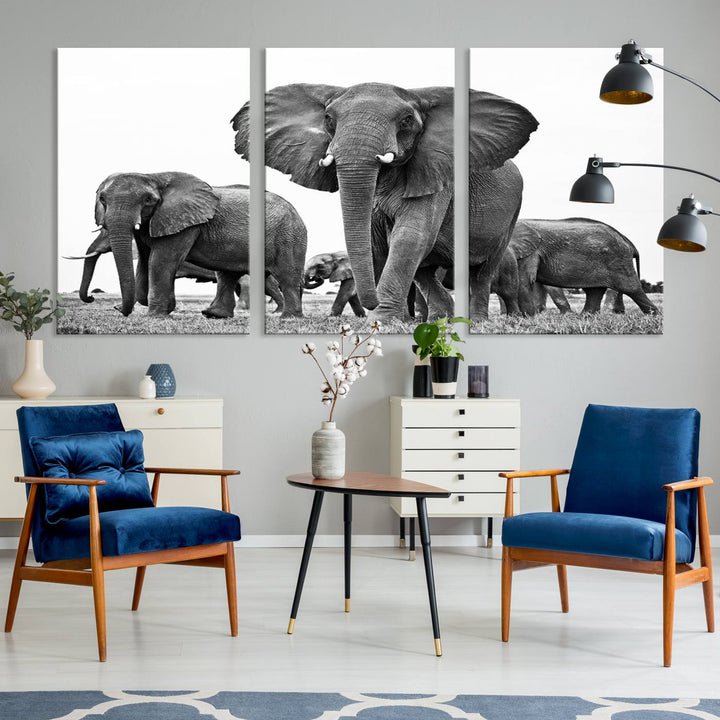 The Black White Elephant Family Wall Art Canvas Print features a triptych of elephants walking in the wild, crafted as gallery-quality wall art on premium canvas.