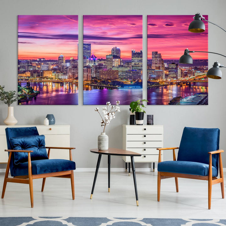 The Pittsburg Wall Art Canvas Print, showcasing a vibrant sunset glow over the city skyline and crafted by a professional artisan, adorns the space.