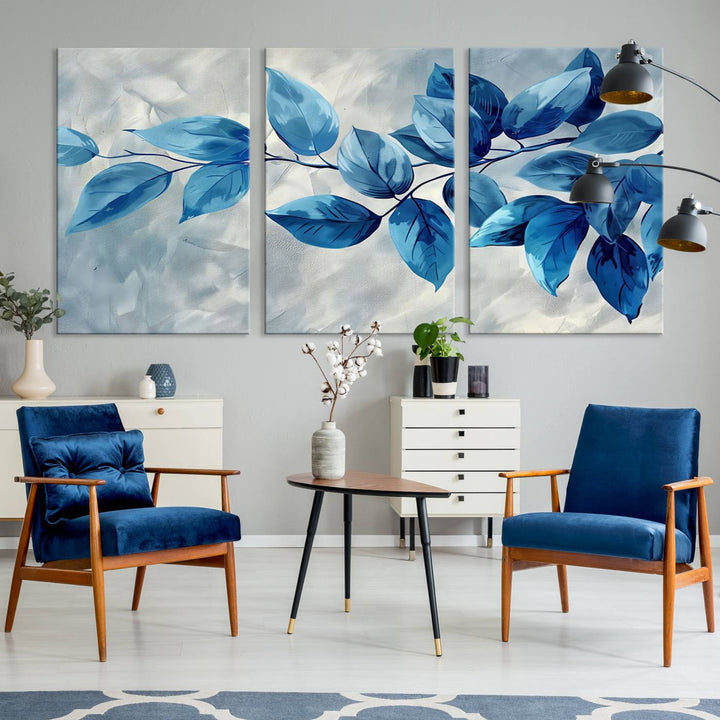 A Blue Leaf Abstract Wall Art Canvas Print, featuring a textured background and gallery-quality finish, is displayed.