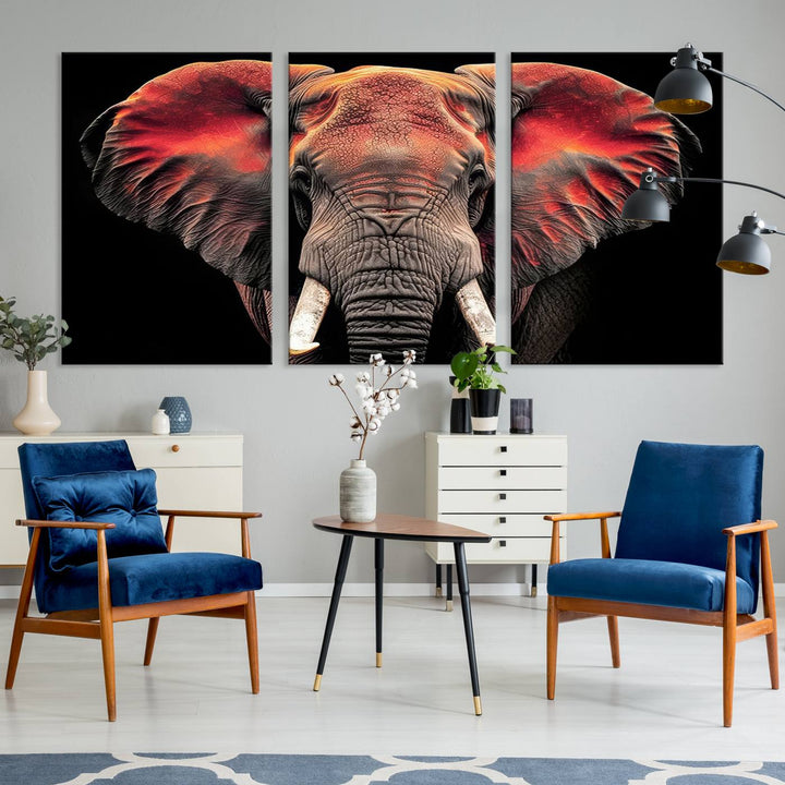 The Elephant Wall Art Canvas Print, featuring vibrant red and black tones, is a stunning artwork printed on museum-quality canvas. It comes with a UV-protective coating.