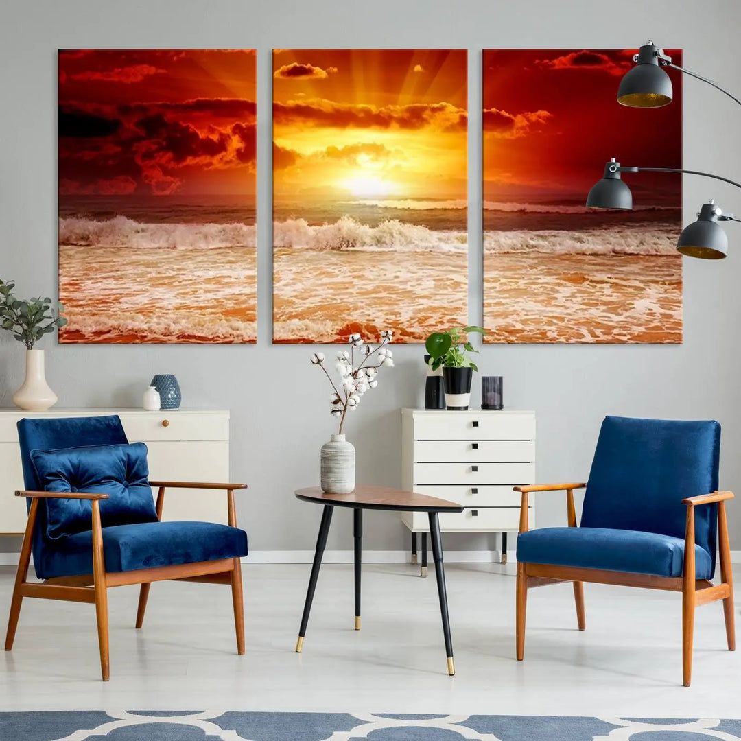 In a modern living room, the vibrant "Wall Art Canvas Perfect Sunset Turns Colour of Sea and Sky to Red," printed on museum-quality canvas, stands out. A floor lamp casts warm light over the ready-to-hang artwork, which includes a UV-protective coating to ensure lasting brilliance.