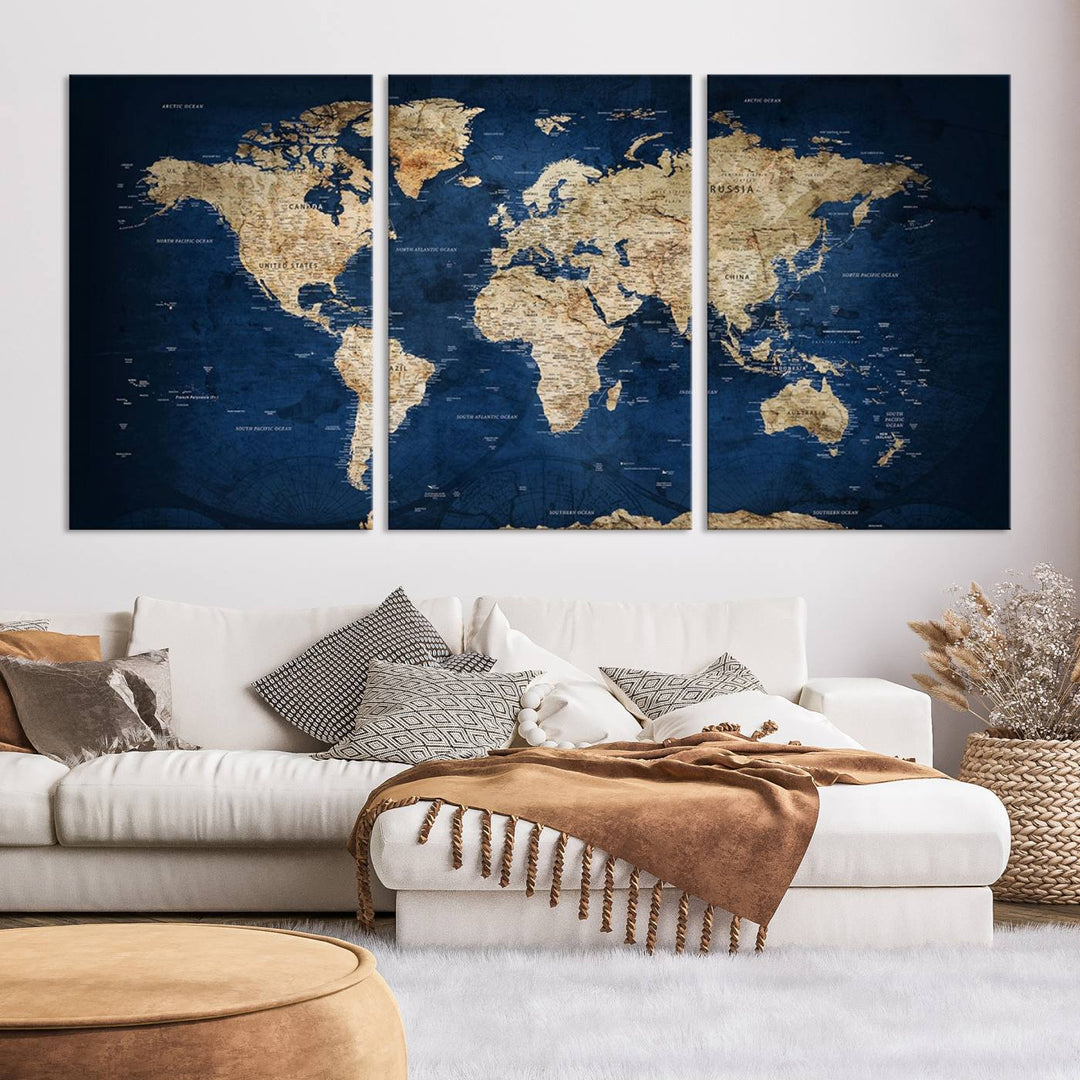 A triptych canvas print titled "Vintage Blue World Map Canvas Print - Classic World Map Design on Deep Blue Wall Art Print" adorns the wall, enhancing the decor with its antique style.