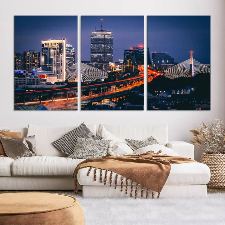 The "Boston City Lights Night Skyline Cityscape View" artwork on the wall showcases a brightly lit bridge at night. It is displayed on museum-quality canvas with a UV-protective coating.