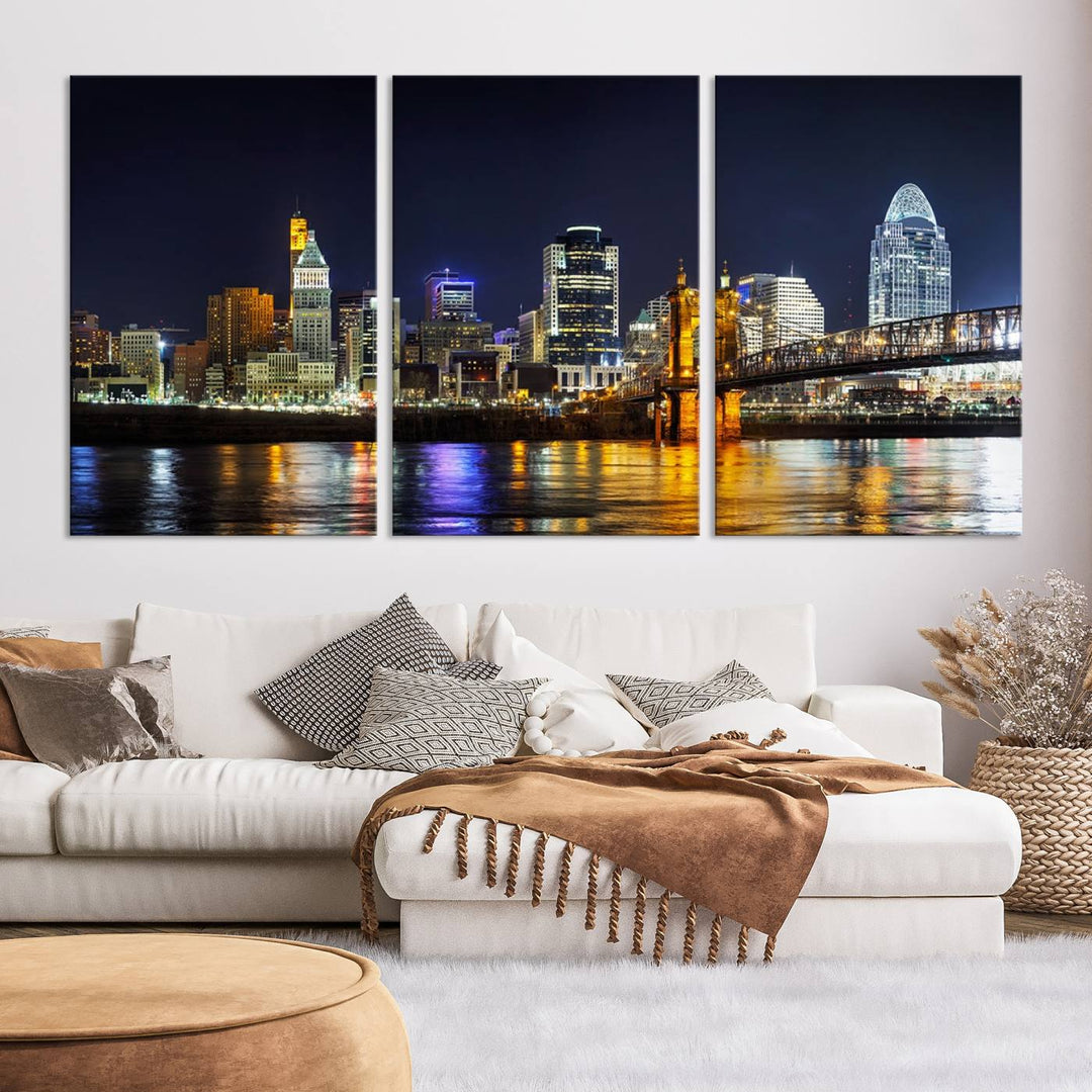 The Cincinnati City Lights Night Skyline Cityscape View Wall Art Canvas Print, crafted on museum-quality canvas with UV-protective coating and ready to hang, adds a touch of sophistication to the wall.