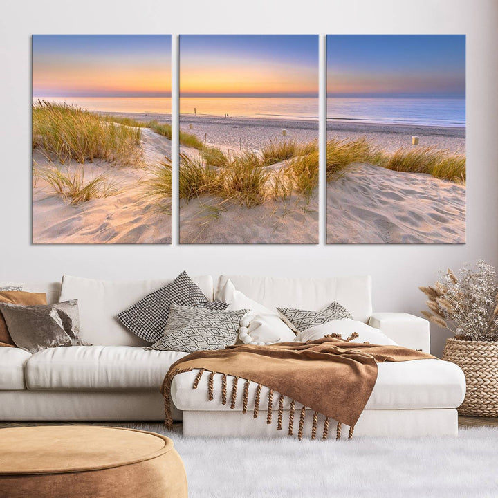 The "Sunset Silence on the Beach" wall art canvas print features a serene beach scene at sunset on museum-quality canvas with a UV-protective coating.