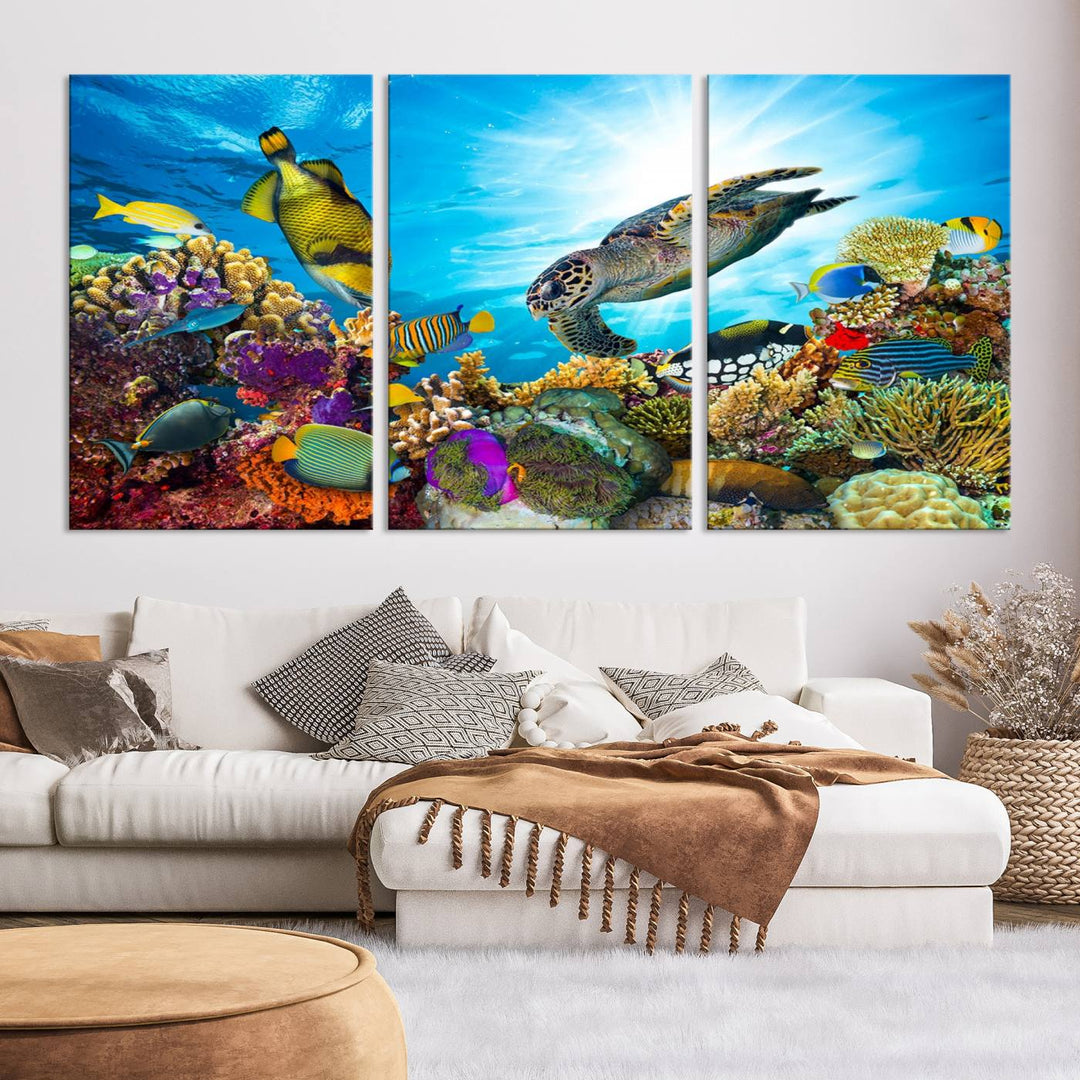 The Aquatic Life Sea Turtles Fish Wall Art Canvas Print is a triptych of vibrant underwater scenes featuring a sea turtle, various fish, and colorful coral. Crafted on museum-quality canvas, this handcrafted masterpiece brings the ocean to life in any space.