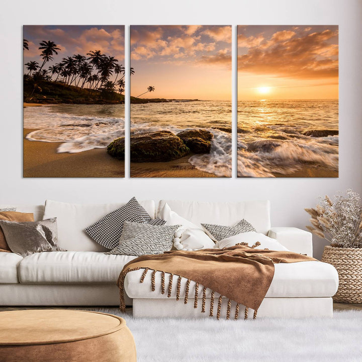 The "Tropical Island Sunset Sunrise Wall Art Canvas Print" is a stunning triptych that showcases a tranquil beach sunset complete with waves and palm trees. Each canvas piece is meticulously hand-assembled and framed using museum-quality polycotton with a UV-protective coating to ensure enduring beauty.