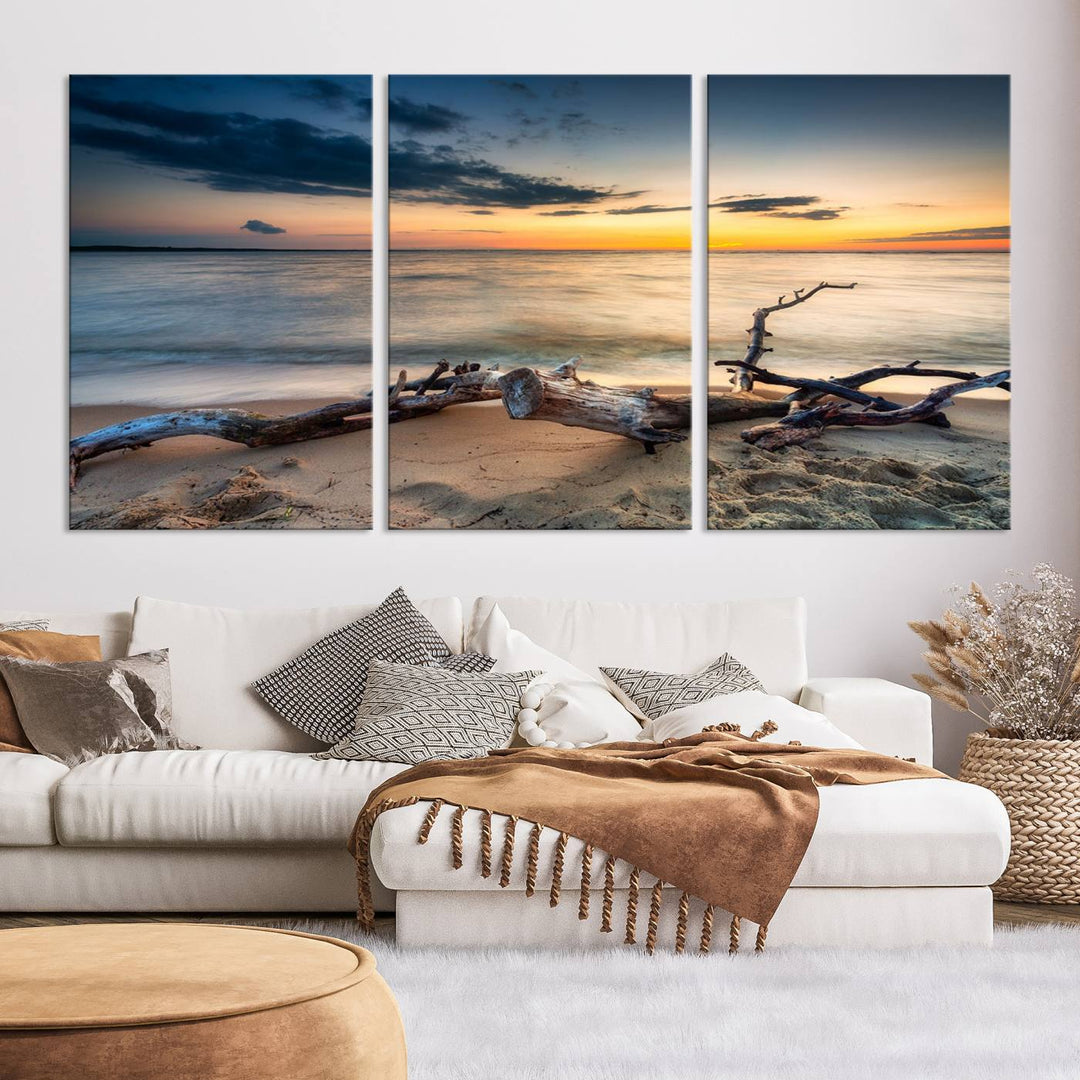 A captivating piece of Ocean Sunset Beach Wall Art Canvas Print, gallery wrapped, graces the gray wall.