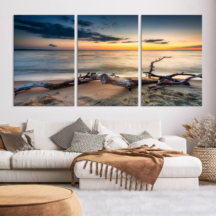 A captivating piece of Ocean Sunset Beach Wall Art Canvas Print, gallery wrapped, graces the gray wall.