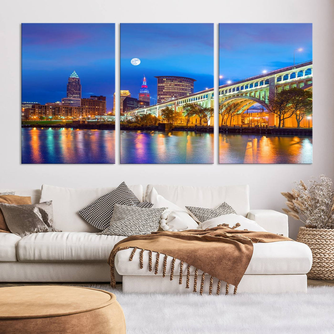 The Cleveland Night Skyline Wall Art City Cityscape Canvas Print portrays a city skyline and bridge lit up against the night sky. This artwork is printed on museum-quality canvas with a gallery-wrapped finish and features a UV-protective coating to ensure lasting vibrancy.