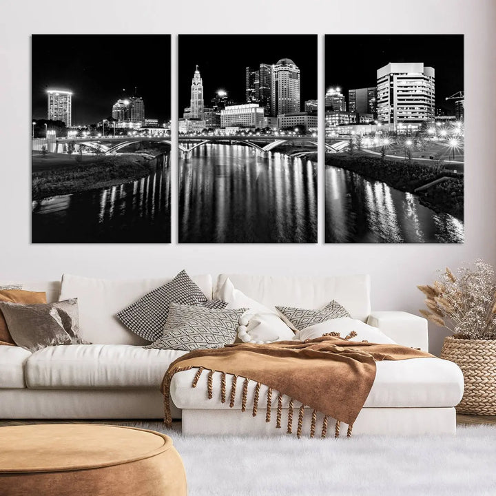 The living room showcases the Columbus City Lights Skyline Black and White Wall Art Cityscape Canvas Print.