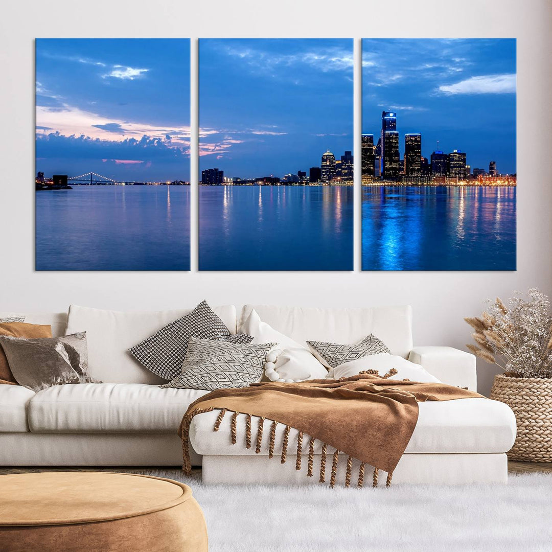 The "Detroit City Lights Night Blue Cloudy Skyline Cityscape View" wall art, displayed on museum-quality canvases, is split into three gallery-wrapped panels.