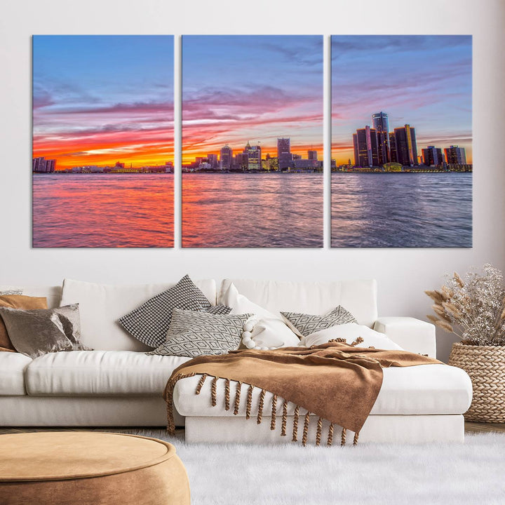 The Detroit City Lights Sunset Colorful Cloudy Skyline Cityscape View Wall Art Canvas Print showcases a vibrant city skyline at sunset over water. The artwork is museum-quality, comes ready to hang, and features a UV-protective coating to preserve its vivid colors.