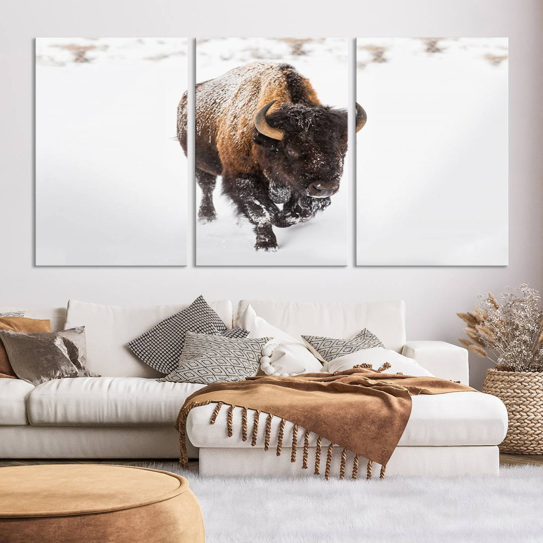 The Bison Winter Wall Art Canvas Print for Farmhouse Decor is displayed as a triptych in the living room. This artwork, printed on museum-quality canvases with a UV-protective coating to maintain its vibrant colors, is the focal point of the space.