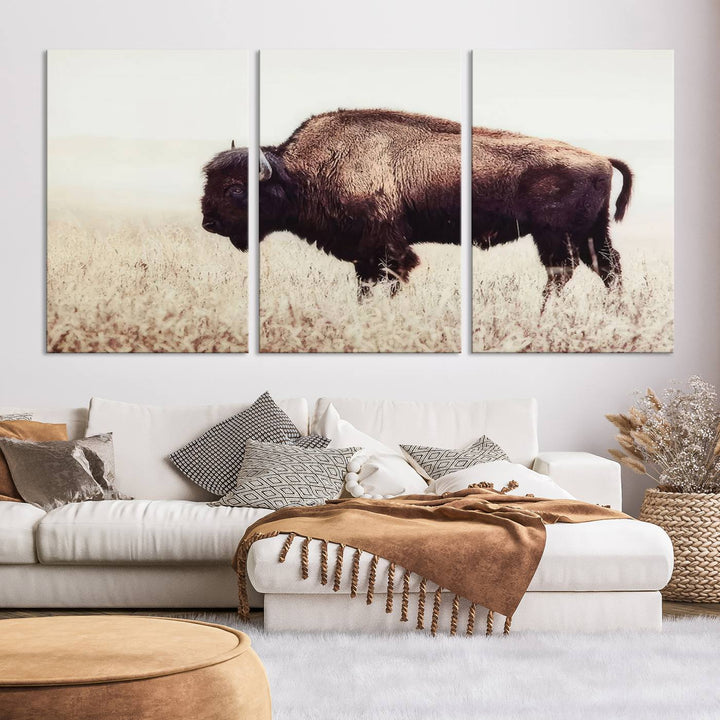 A stylish living room showcases the captivating "Bison in Field" Wall Art Canvas Print as farmhouse decor.