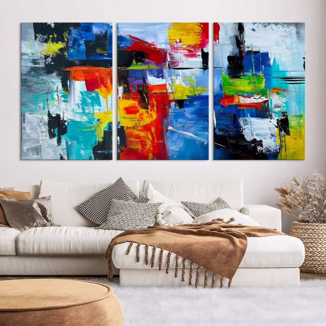 Three Colorful Abstract Wall Art Canvas Prints feature vibrant colors on museum-quality canvas and are finished with a UV-protective coating. Their ready-to-hang design allows for effortless transformation of your space.