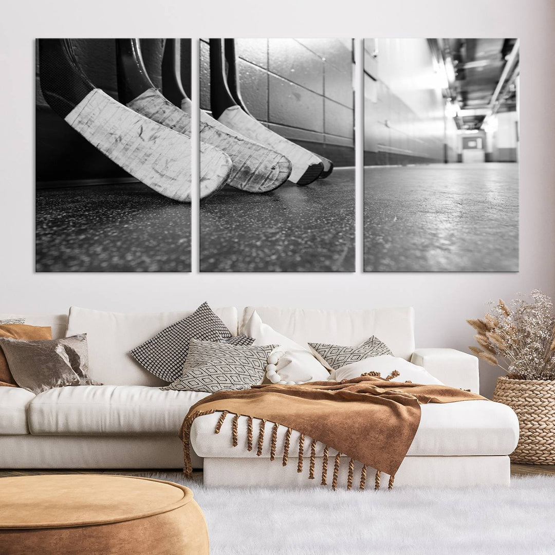 A living room featuring a large Ice Hockey Wall Art Canvas Print on gallery-wrapped canvas.