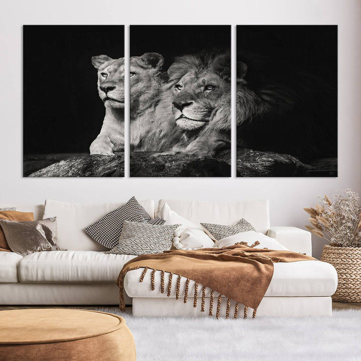 The elegant wildlife portrait, "Lion Couple Canvas Wall Art Print," featuring a black and white depiction of a lion family, majestically decorates the living room wall.