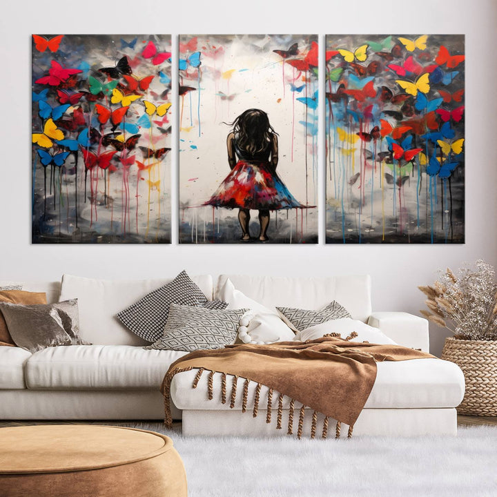 The Girl Butterfly Graffiti Abstract Canvas Print, featuring a vibrant depiction of a girl surrounded by butterflies on museum-quality canvas, is displayed prominently.