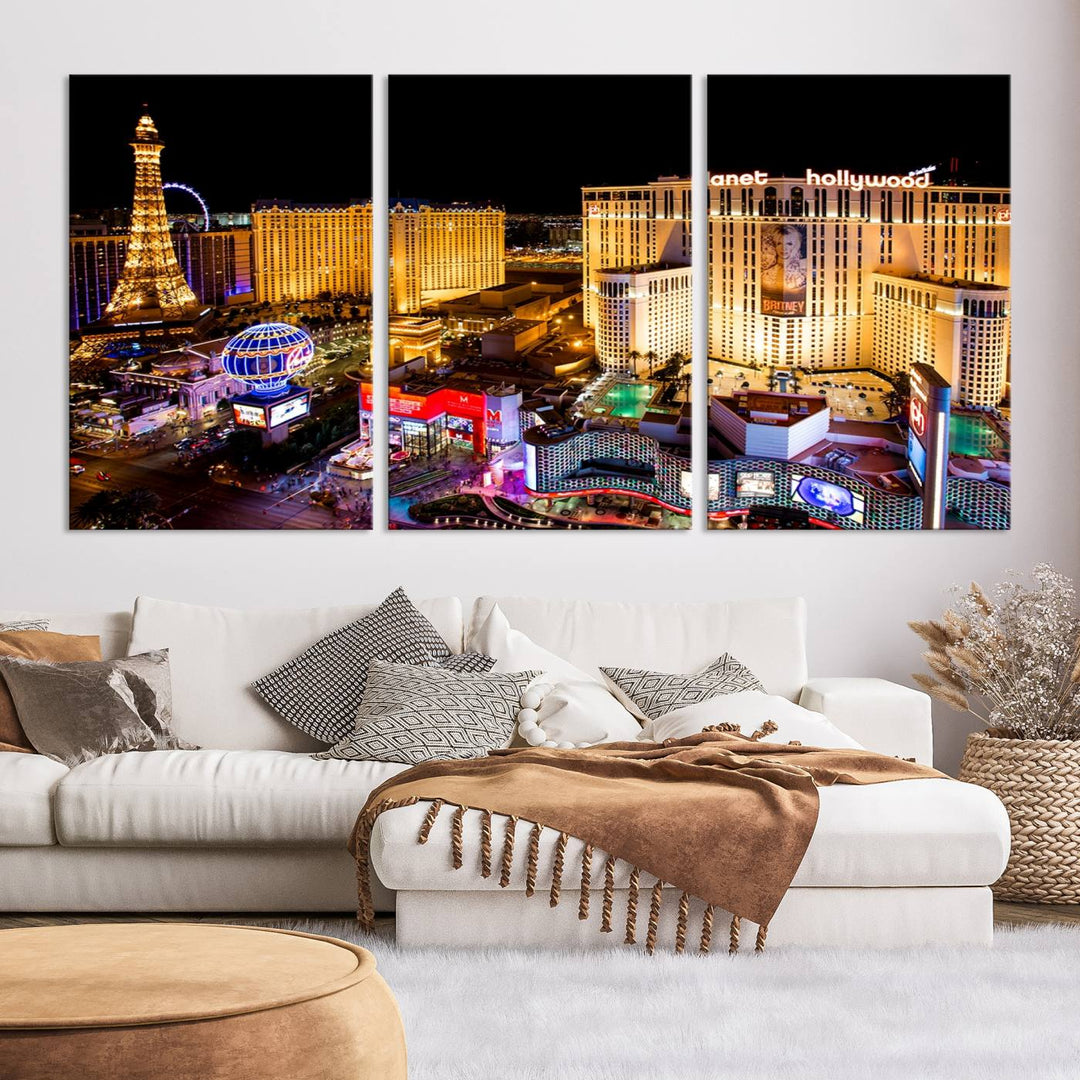 The Las Vegas Wall Art Canvas Print is a triptych set that showcases a stunning night view of Las Vegas. The illuminated buildings and the iconic faux Eiffel Tower add elegance to any space. Each piece comes with a UV-protective coating and is ready to hang, ensuring both style and durability.