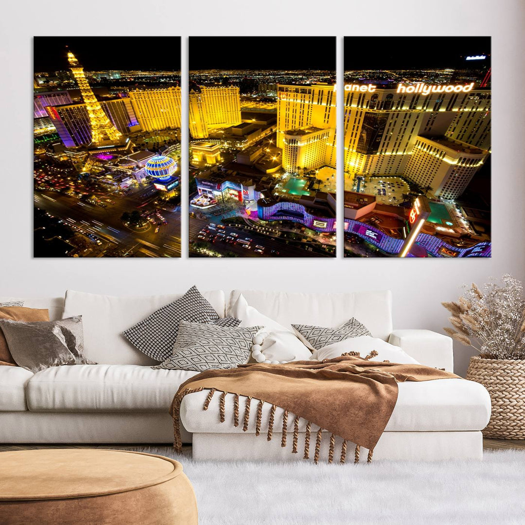 The modern living room features a Las Vegas Wall Art Canvas Print, a museum-quality triptych showcasing a vibrant cityscape with neon lights.