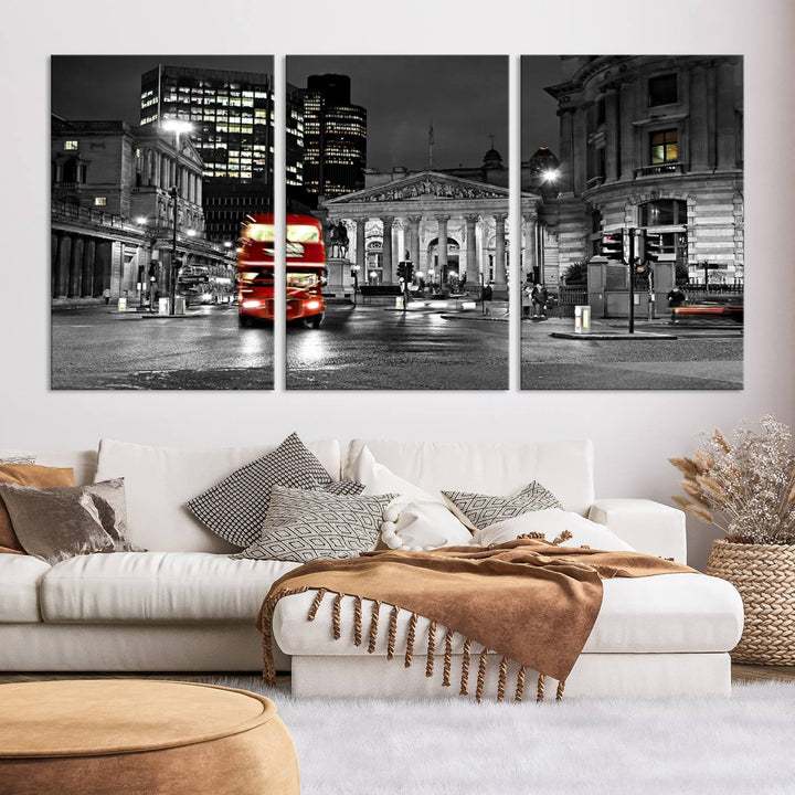 The London Night Red Bus Wall Art Canvas Print features a black and white cityscape with a moving red double-decker bus, crafted on museum-quality canvas with a UV-protective coating. This ready-to-hang artwork is designed to stand out and enhance any space.